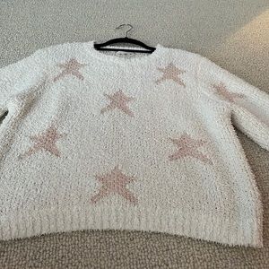 White sweater with pink star size medium